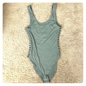 VS Pink Ribbed Bodysuit with Ladder Cutout Sides